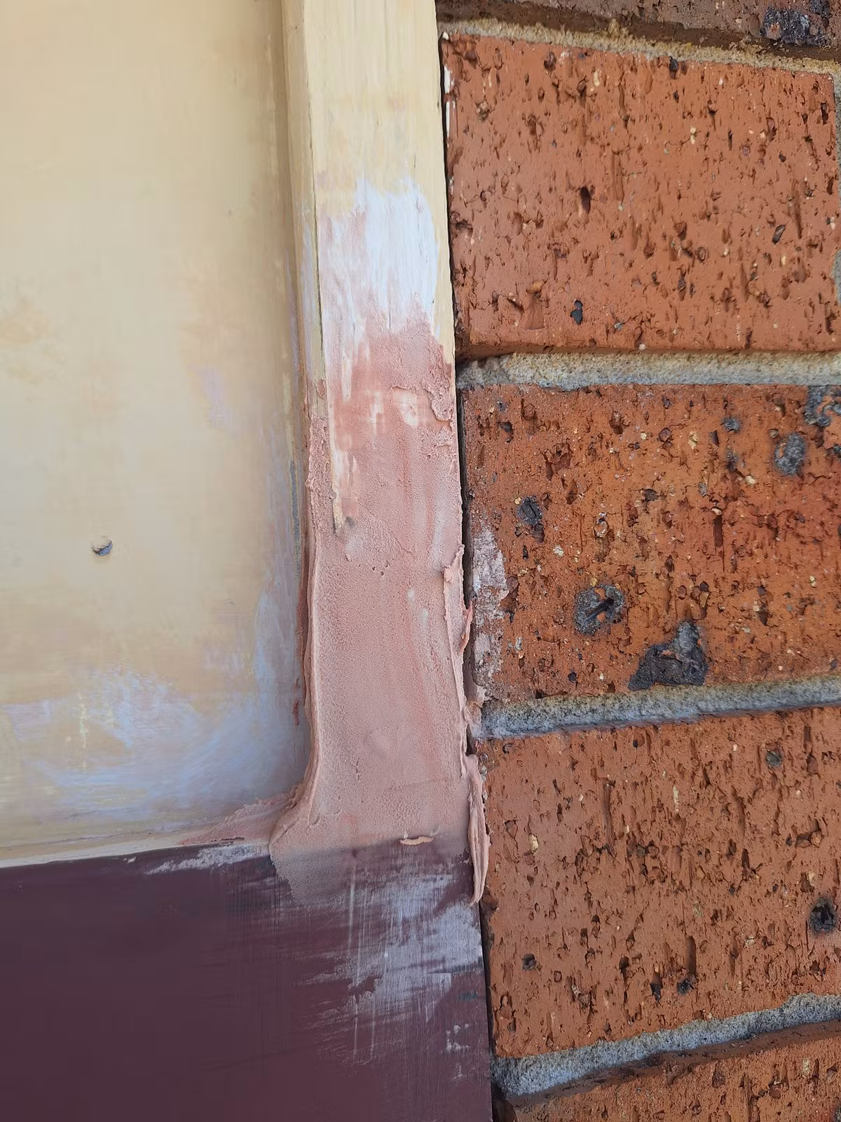 Builder’s bog applied to rebuild the damaged section of timber trim