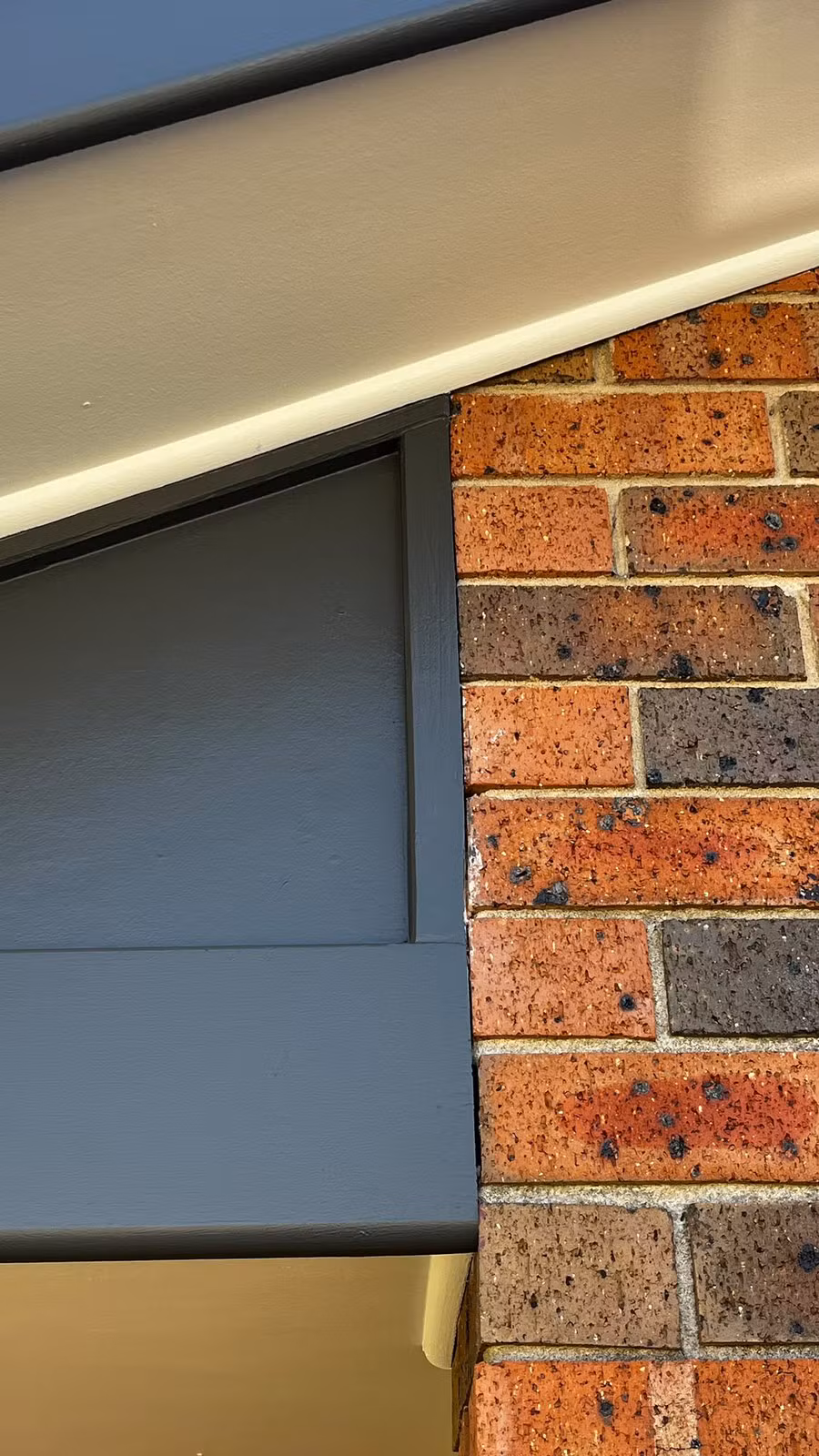 Completed timber trim repair finished in Woodland Grey