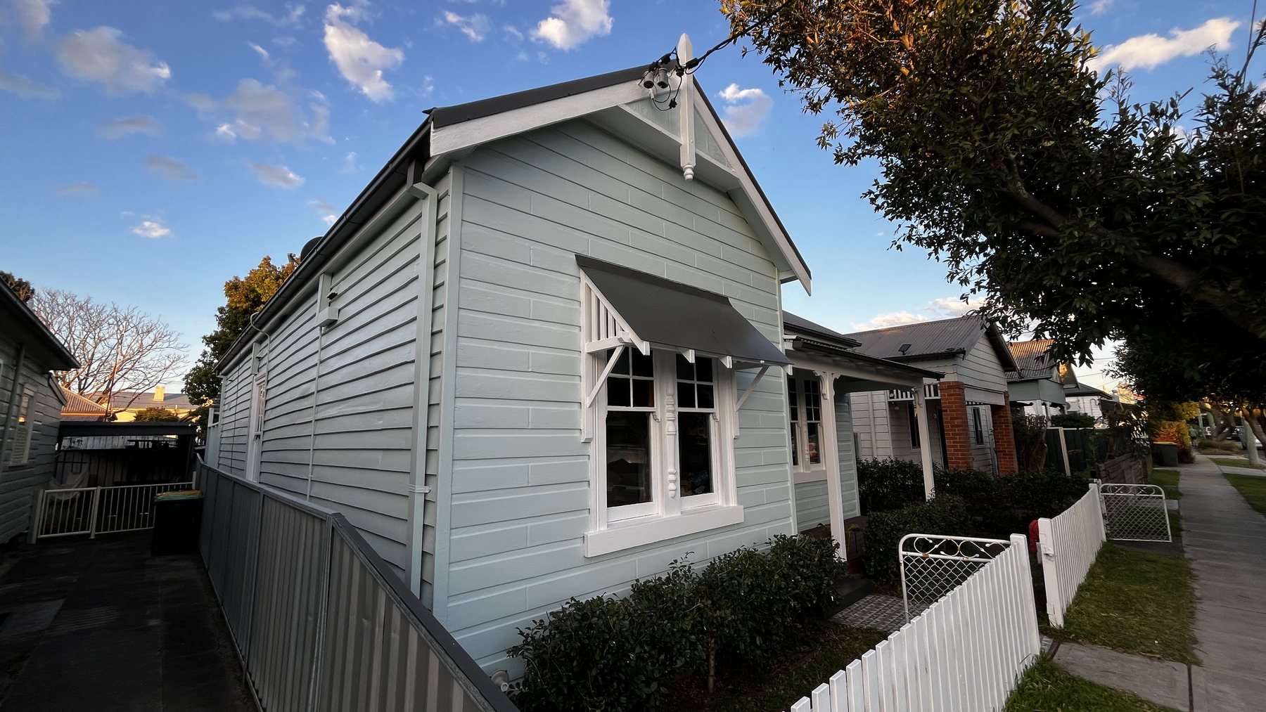Finished 100-year-old weatherboard house repaint in Newcastle